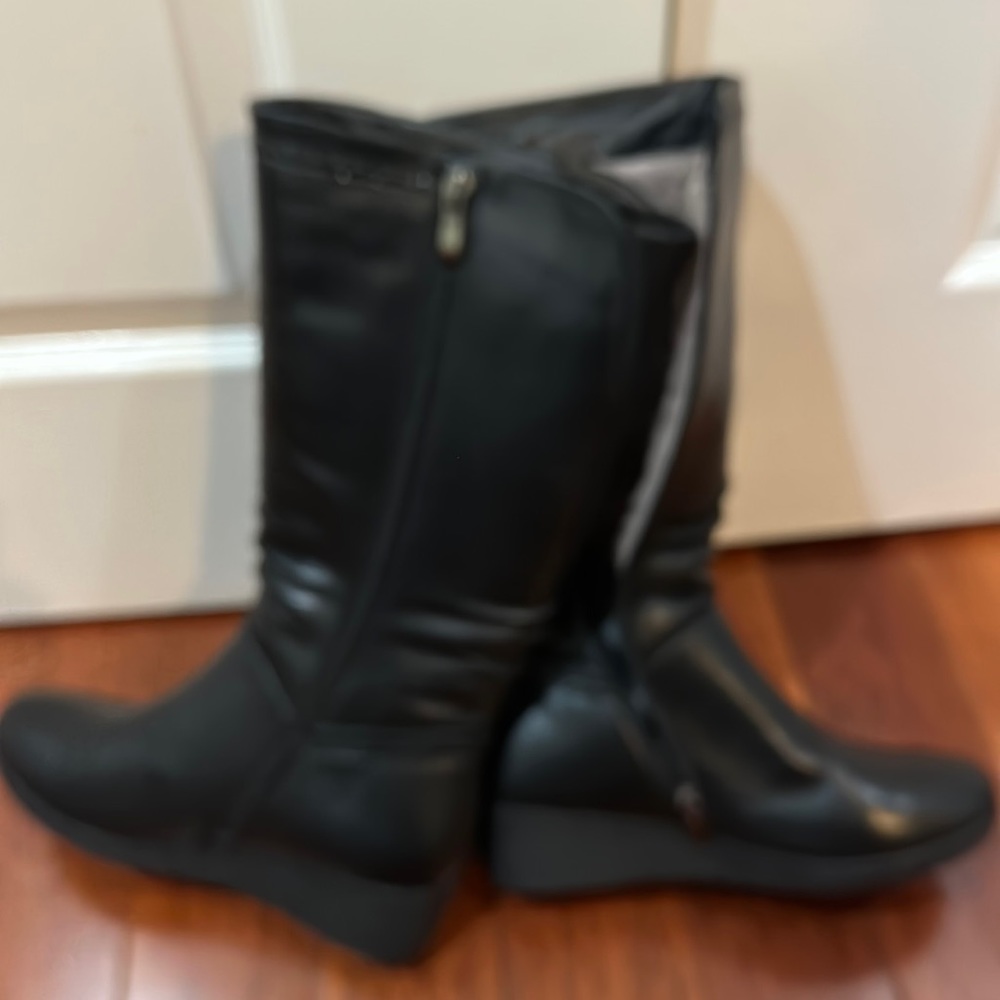 Black wedge boots; new, never worn; size 37